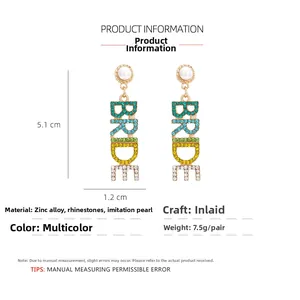 Detail view of BRIDE letter earrings with colorful rhinestones and size measurements