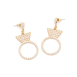 Detailed macro shot of vintage gold heart earrings with pearl clusters and geometric rings