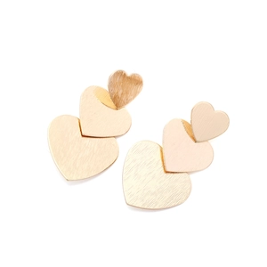 Golden triple layered heart earrings with brushed metal texture in a minimalist drop style