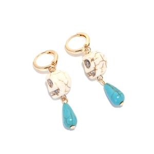Bohemian skull earrings with turquoise teardrop beads and vintage gold metal finish