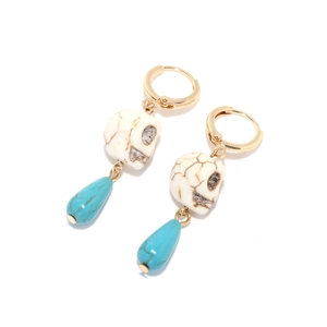 Bohemian skull earrings with turquoise teardrop charms and gold metal hooks