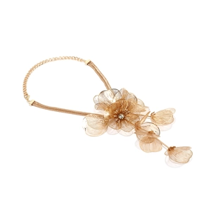 Exaggerated layered gold floral necklace with metal mesh flowers and crystal accents
