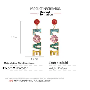 Detail view of LOVE letter earrings with colorful crystals and size 7.0cm x 1.7cm
