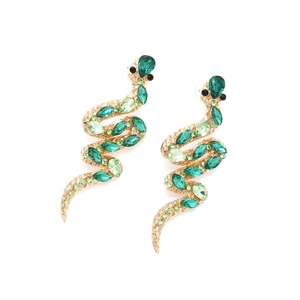 Luxurious gold snake earrings with emerald green crystals in a curved animal design