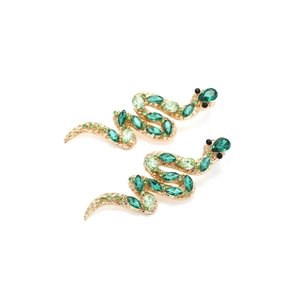 S-shaped snake earrings in gold finish with vibrant green crystals on white background