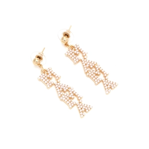Detailed view of gold MAMA letter earrings featuring micro-set white pearls on the design