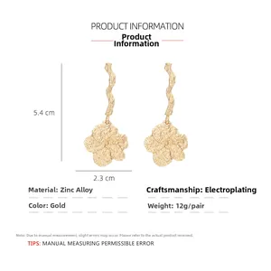 Detailed size specifications of long gold flower earrings showing 5.4cm height and 2.3cm width