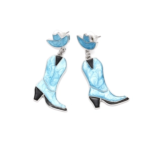 Detail view of Western style earrings featuring blue enamel cowboy hat and boot charms