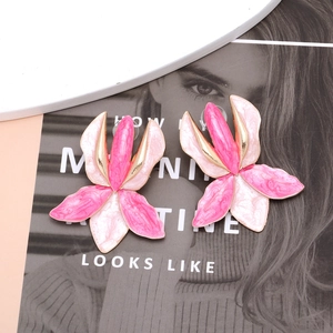 Exaggerated oversized pink and white enamel flower earrings with golden metal edges