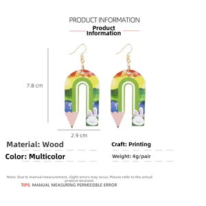 Detailed view of lightweight U-shaped wooden earrings with rabbit and rainbow pencil print