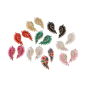 Exaggerated colorful crystal wing earrings set in 10 different vibrant luxury colors
