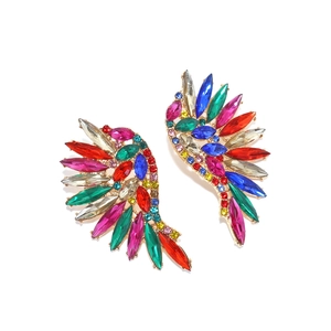 Detailed close-up of colorful rhinestone wing earrings with multi-color crystal inlay