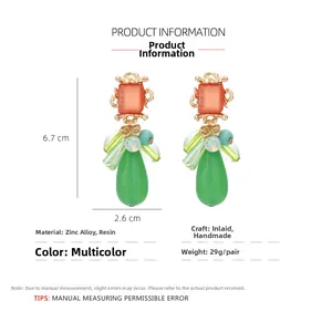 Detailed size chart showing 6.7cm teardrop earrings in zinc alloy and colorful resin