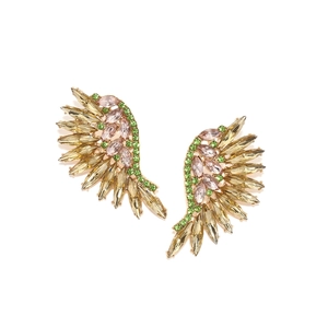 Macro detail of luxury fan-shaped wing earrings featuring colorful crystals and golden plating
