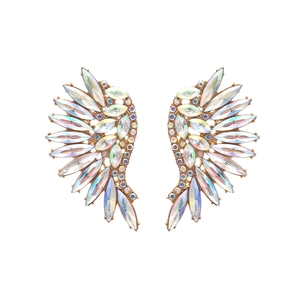 Detailed view of wing-shaped earrings with sparkling colorful rhinestones and gold base