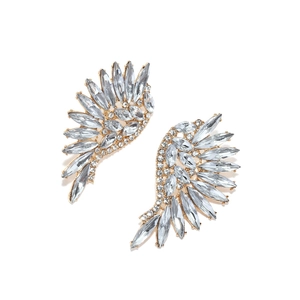 Macro shot of wing earrings featuring detailed gold alloy base and sparkling crystals