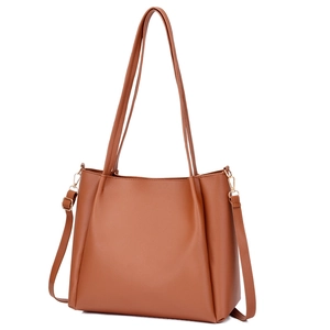 Classic brown PU leather tote bag with adjustable shoulder strap and dual top handles