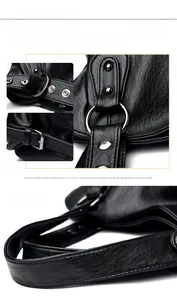 Detail der schwarzen Handtasche aus PU-Leder mit Silberring-Hardware und verstärkten Nähten