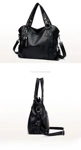 Detailaufnahmen einer schwarzen Shopper aus Lederimitat mit silbernen Beschlägen