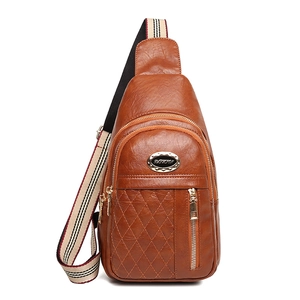 Women's brown faux leather crossbody bag with quilted pattern and striped strap