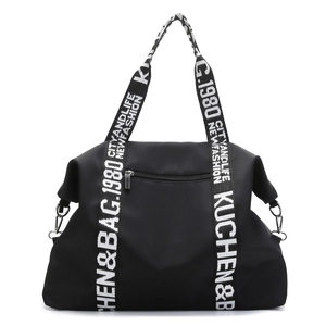 Black waterproof nylon travel tote bag with large capacity and lettered webbing handles