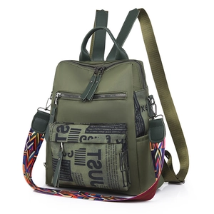 Army green nylon backpack with vintage print and colorful geometric shoulder strap