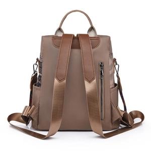 Women's Oxford cloth anti-theft backpack with brown leather trim and side letter patterns