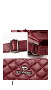 Macro detail of wine red quilted leather handbag with silver kangaroo logo and hardware