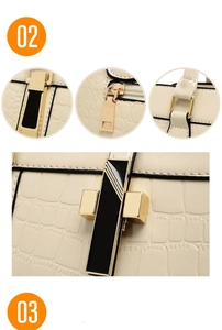 Détail d'un sac à main crème gaufré crocodile avec boucles métalliques dorées élégantes