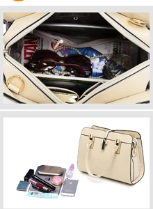 Détail de l'intérieur du sac à main motif crocodile montrant les compartiments spacieux