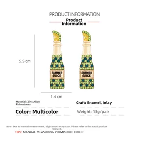 Detail showing dimensions of summer juice bottle earrings with rhinestones and enamel