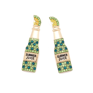 Close-up of lemon slice top and summer juice bottle earring with green crystals
