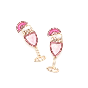 Detail of cocktail glass earrings with pink enamel and sparkling white pearls