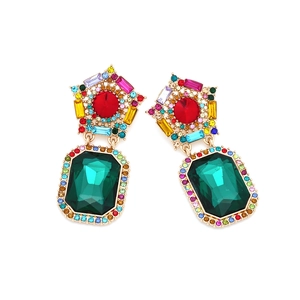 Luxurious multi-color crystal star earrings with green emerald-cut drop in gold setting