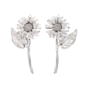 Vintage silver sunflower drop earrings with textured petals and leaf design on white background