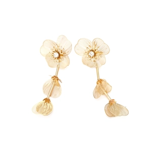 Luxurious layered gold metal flower drop earrings with sparkling rhinestone centers