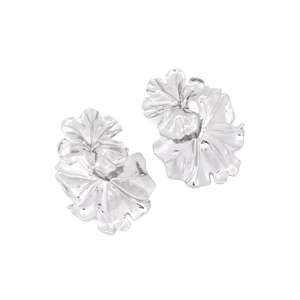 Close-up of silver-tone wrinkled leaf-shaped earrings with textured metallic petals