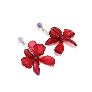 Deep red acrylic leaf flower earrings with purple beads and gold wire detailing