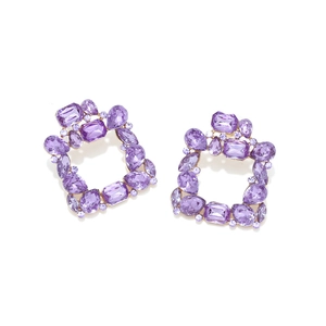 Detail of square gold drop earrings featuring lavender crystals in various elegant cuts