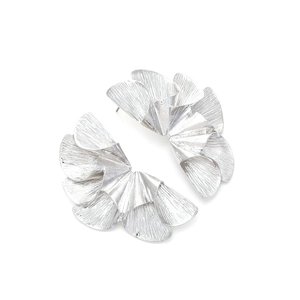 Artistic silver fan leaf earrings with a brushed metal texture on a white background
