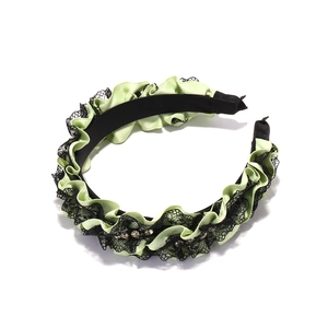Mint green pleated lace headband with crystal accents and ruffles in a wide vintage style