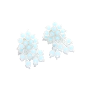 Detail view of light blue handmade beaded floral tassel earrings with frosted beads