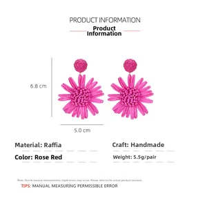 Spécifications détaillées des boucles d'oreilles tournesol en raphia fait main rose
