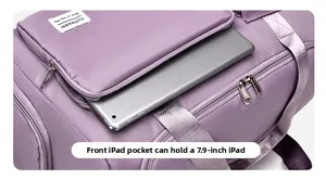 Detailed view of the front pocket storing a 7.9-inch iPad in a purple travel bag