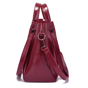 Dark red vintage shoulder bag in oily leather with top handles and adjustable strap