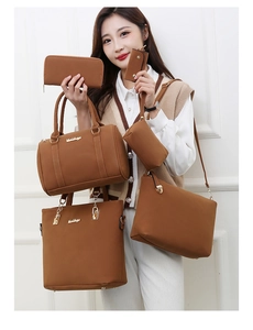 Detail view of 6-piece caramel brown handbag set featuring tote and matching accessories
