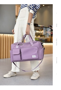 Detail of purple waterproof nylon travel bag showing large capacity and multi-pocket design