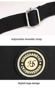 Detail of adjustable woven shoulder strap with silver buckle and circular brand logo