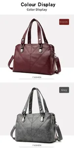 Detail of burgundy and gray tote bags with V-shaped stitching and adjustable straps