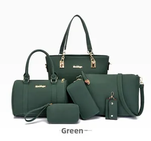 Six-piece dark green tote bag set including handbags and wallets with gold hardware